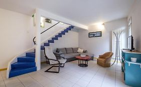 Les Volets Bleus T3 de 80 m2 patio privatif